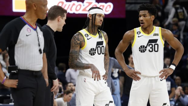 Utah Jazz head coach Will Hardy (left) talks with guard Jordan Clarkson (00) and guard Ochai Agbaji (30) during the second half against the Memphis Grizzlies at FedExForum.